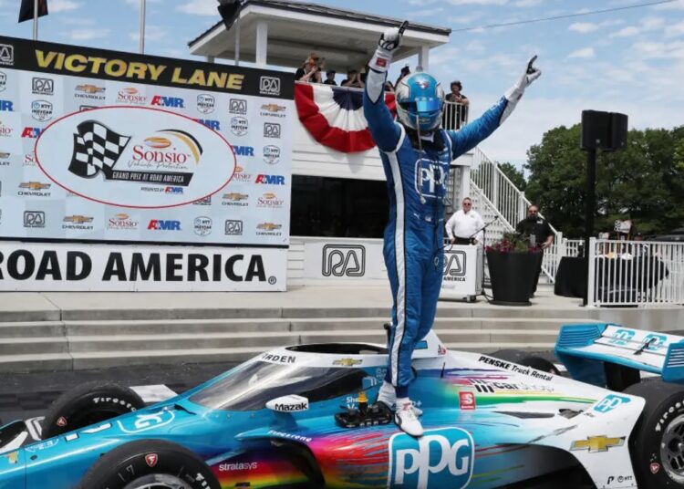 Josef Newgarden reacts after winning the Sonsio Grand Prix, Sunday, June 12, 2022, in Elkhart Lake, Wisconsin.