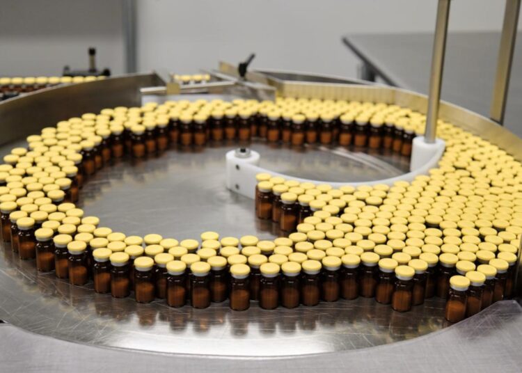 This undated photo provided by Daiichi Sankyo and AstraZeneca in June 2022 shows production of their Enhertu, an antibody-chemotherapy drug administered intravenously.