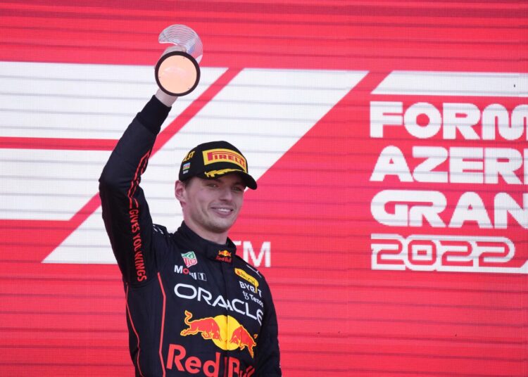 Max Verstappen of the Netherlands celebrates on the podium after winning the Azerbaijan Formula One Grand Prix in Baku.