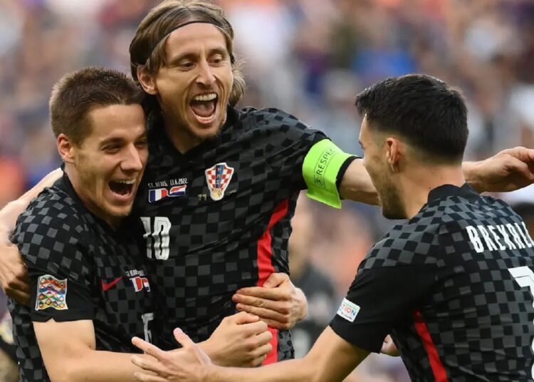 France loses to Croatia in UEFA Nations League 1 - Egyptian Gazette Croatia's Luka Modric celebrates with teammates after scoring his side's opening goal during the UEFA Nations League match againsr France.