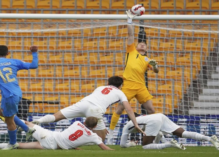 Goalkeeper Aaron Ramsdale of England makes a save against Italy during their Nations League match in Wolverhampton, England.