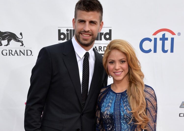 FILE - Colombian singer Shakira, right, and FC Barcelona's soccer player Gerard Pique pose to the media during the presentation of her new album "Shakira" in Barcelona, Spain, on March 20, 2014.