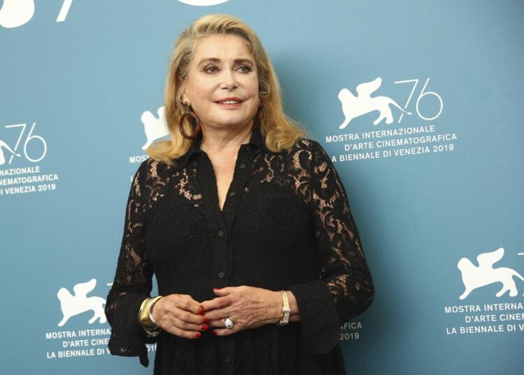 FILE - Actor Catherine Deneuve appears at the photo call for the film "The Truth" at the 76th edition of the Venice Film Festival in Venice, Italy, on Aug. 28, 2019. Deneuve will receive the Golden Lion for lifetime achievement award at the 79th Venice International Film Festival in September, organisers said Wednesday. Deneuve, now 78, was a key figure in the French New Wave thanks to collaborations with directors like Jacques Demy, Luis Buñuel and François Truffaut. She won the festival’s Golden Lion in 1967.
