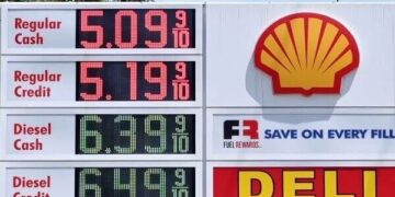 US gasoline average price tops $5 per gallon in historic first
