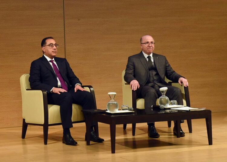 Egypt's Prime Minister Moustafa Madbouli and his Algerian counterpart Aymen Ben Abdel Rahman.