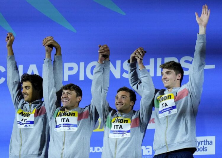 Team of Italy celebrates after winning the men's 4x100m medley relay at the 19th FINA World Championships in Budapest.