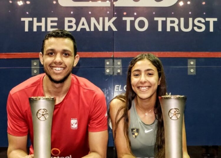 Moustafa Asal and Hania el-Hammamy pose with their trophies after winning El-Gouna International Squash Open.