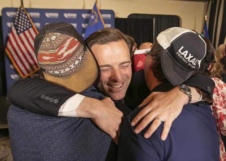 Nevada Republican U.S. Senate candidate Adam Laxalt celebrates his victory with family, friends and supporters at the Tamarack Casino in Reno, Nev., on Tuesday, June 14, 2022.