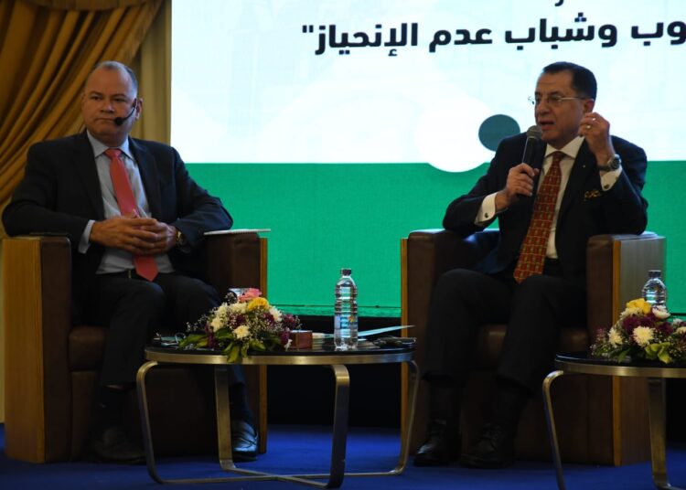 Eyad Abu El Haggag, Chairman of Dar al-Tahrir for Printing and Publishing, and TV broadcaster Nashat el-Deehy during the dialogue session on Monday.