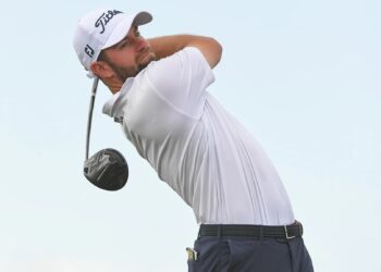 Young storms into British Open lead