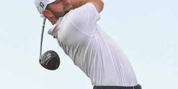 Young storms into British Open lead