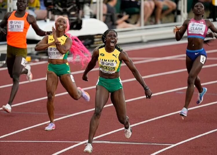 Shericka Jackson, of Jamaica (2nd R) wins the final of the women's 200-meter run ahead of Shelly-Ann Fraser-Pryce, of Jamaica, at the World Athletics Championships in Eugene, Ore.