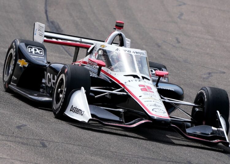 Josef Newgarden drives during an IndyCar Series auto race at Iowa Speedway in Newton, Iowa.