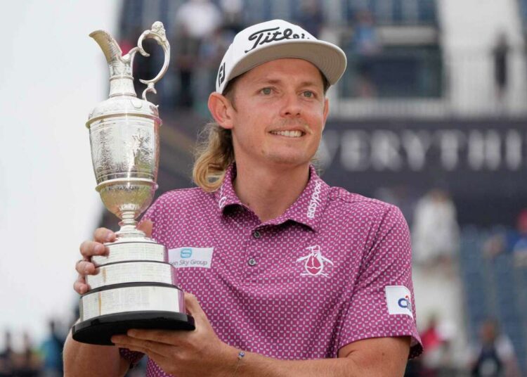 Cameron Smith, of Australia, holds the claret jug trophy after winning the British Open golf Championship.