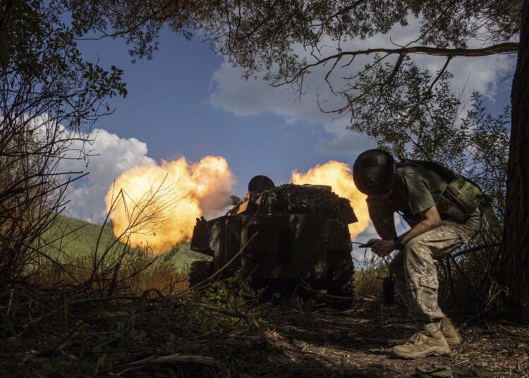 Ukrainian self-propelled artillery shoots towards Russian forces at a frontline in Kharkiv region, Ukraine, yesterday.
