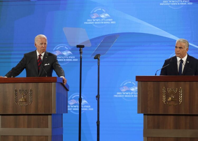 US President Joe Biden, left, giving a press conference with Israel's Prime Minister Yair Lapid, at the Waldorf Astoria Hotel in Jerusalem, Thursday.