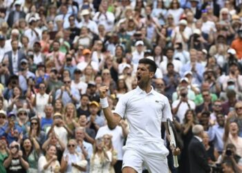 Djokovic battles into Wimbledon semi-finals as Jabeur makes history