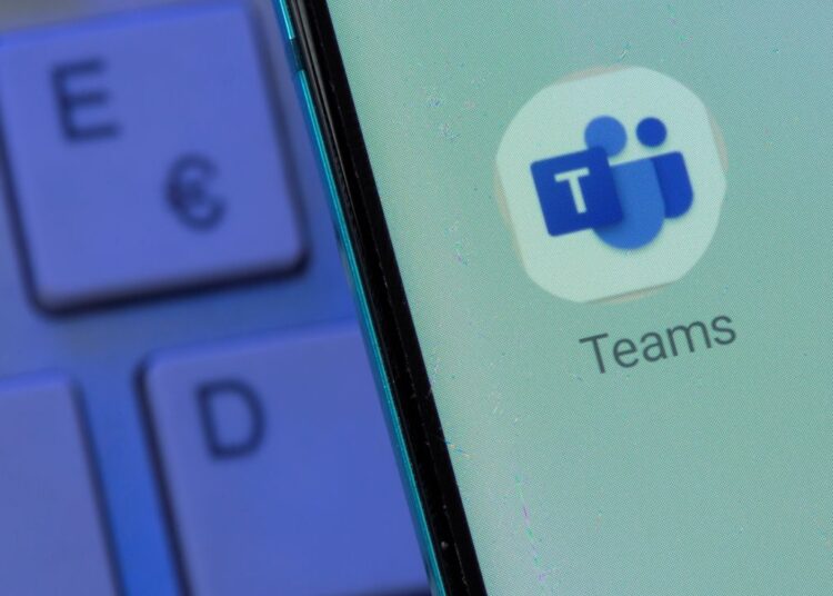 Microsoft Teams back up for most users after global outage 1 - Egyptian Gazette Microsoft Teams app is seen on the smartphone placed on the keyboard in this illustration taken, July 26, 2021.