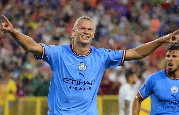 Erling Haaland of Manchester City celebrates after scoring their team's first goal during the pre-season friendly match between Bayern Munich and Manchester City at Lambeau Field in Green Bay, Wisconsin.