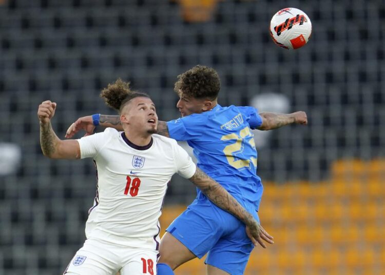 Kalvin Philips of England, left, and Salvatore Esposito of Italy battle for the ball during the Nations League soccer match between England and Italy at Molineux Stadium in Wolverhampton, England, Saturday, June 11, 2022.