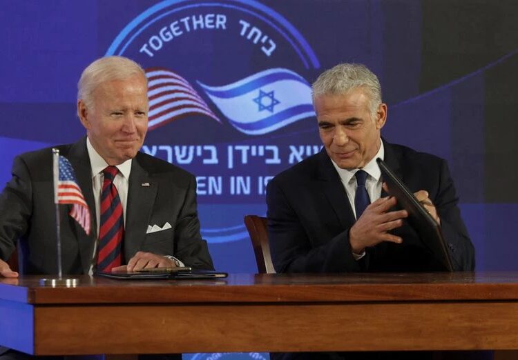 U.S. President Joe Biden and Israeli Prime Minister Yair Lapid attend the first virtual meeting of the "I2U2" group with leaders of India and the United Arab Emirates, in Jerusalem