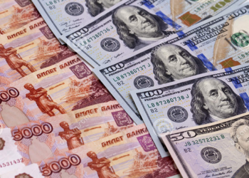 Rouble recovers past 61 vs dollar after sharp slide