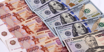 Rouble recovers past 61 vs dollar after sharp slide