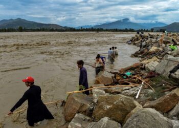 Pakistan orders thousands to evacuate near flood-swollen rivers
