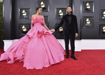 Chrissy Teigen reveals baby bump after 2020 pregnancy loss