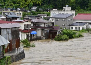 Heavy rain hits northeastern, central Japan, 100,000 told to evacuate