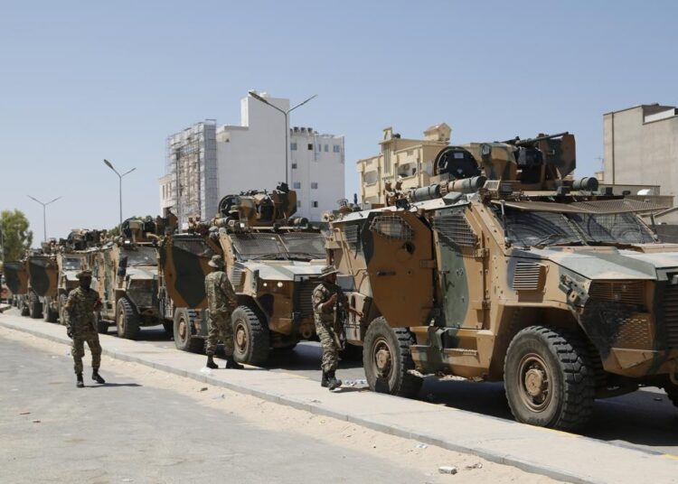 Libyan forces are deployed in Tripoli, Libya, Saturday, Aug. 27, 2022. Clashes broke out early Saturday between rival militias in Libya's capital, a health official said