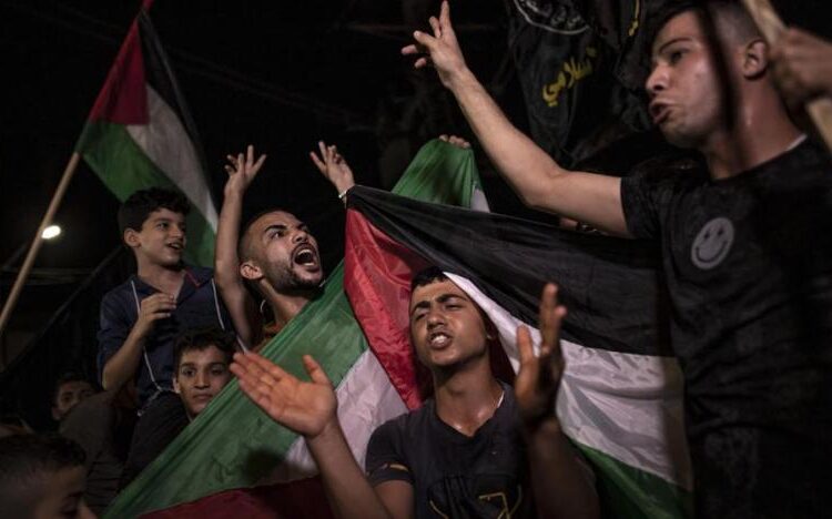 FILE: Palestinians celebrate the cease-fire agreement between Israel and Islamic Jihad Movement in Gaza City.