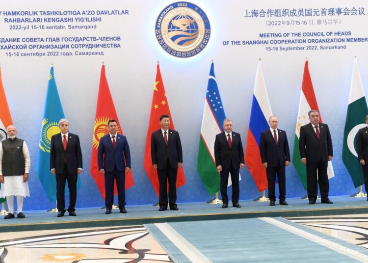 Putin says Russia ready to give free fertilizers to developing world 1 - Egyptian Gazette Indian Prime Minister Narendra Modi, Chinese President Xi Jinping, Russian President Vladimir Putin and others pose for photographs during Shanghai Cooperation Organisation summit in Samarkand, Uzbekistan on September 16, 2022.