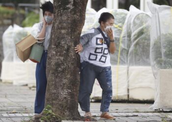 China, Japan ground ferries, flights as typhoon approaches