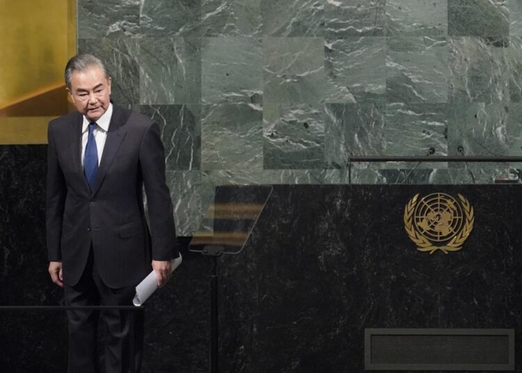 Foreign Minister of China Wang Yi acknowledges the audience applause after addressing the 77th session of the United Nations General Assembly, Saturday, Sept. 24, 2022 at U.N. headquarters. (AP Photo/Mary Altaffer)