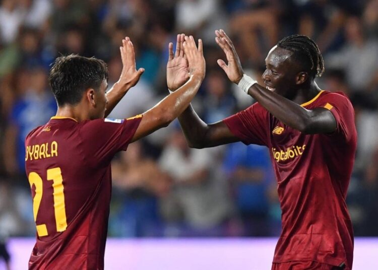 Roma's Tammy Abraham (R) celebrates scoring their second goal against Empoli with Paulo Dybala in Empoli.