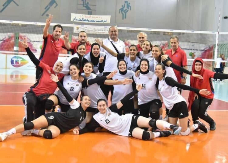 Egyptian women's volleyball team celebrating after beating Morocco 3-0 in the semi-final.