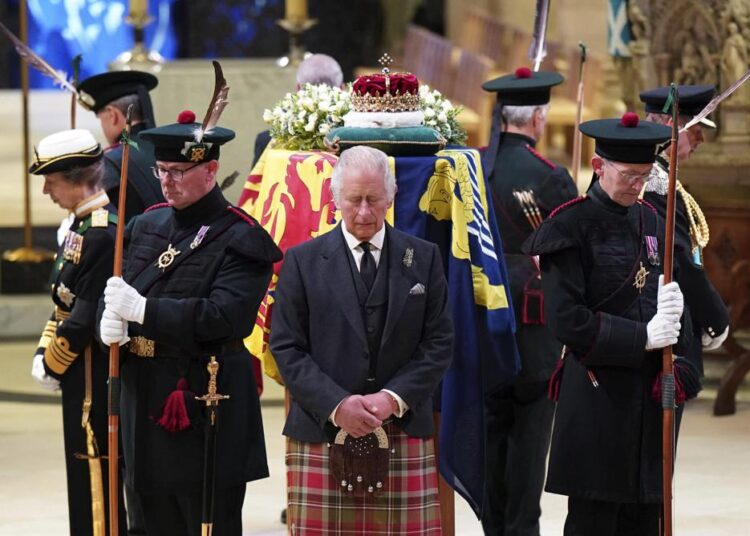 King Charles in Belfast, queen’s coffin to return to London 1 - Egyptian Gazette Britain's King Charles III, (C), and other members of the royal family hold a vigil at the coffin of Queen Elizabeth II at St Giles' Cathedral, Edinburgh, Scotland, on Monday September 12, 2022.