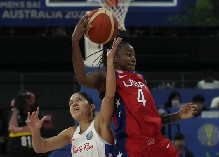 United States' Jewell Loyd keeping the ball from Puerto Rico's Pamela Rosado at the women's Basketball World Cup in Sydney.