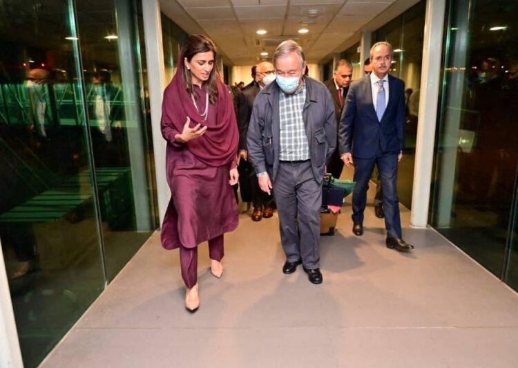 UN chief Guterres arrives in Pakistan to support flood response 1 - Egyptian Gazette UN Secretary-General Antonio Guterres walks with Pakistan's Minister of State for Foreign Affairs Hina Rabbani Khar, upon his arrival at the Islamabad International Airport in Islamabad, Pakistan September 9, 2022.