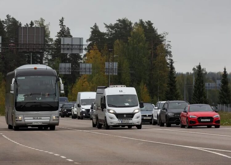 Cars coming from Russia wait in lines at the Vaalimaa border check point between Finland and Russia in Virolahti, Eastern Finland Wednesday, Sept. 28, 2022.
