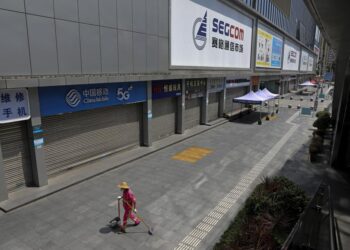 China locks down 65 million, discourages holiday travel