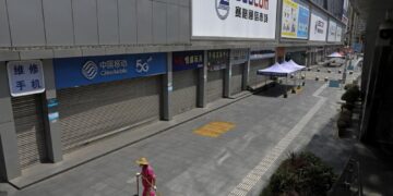 China locks down 65 million, discourages holiday travel