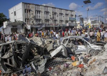 Somalia’s president says at least 100 killed in car bombings