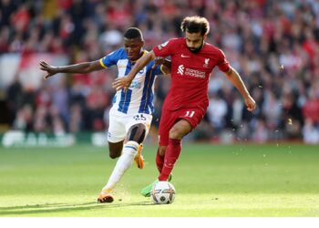 Leaders Arsenal wins derby as Liverpool draws