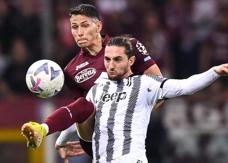 Juventus wins derby at Torino in Serie A 1 - Egyptian Gazette Torino's Sasa Lukic (L) and Juventus' Adrien Rabiot fight for the ball during their Serie A match in Turin.
