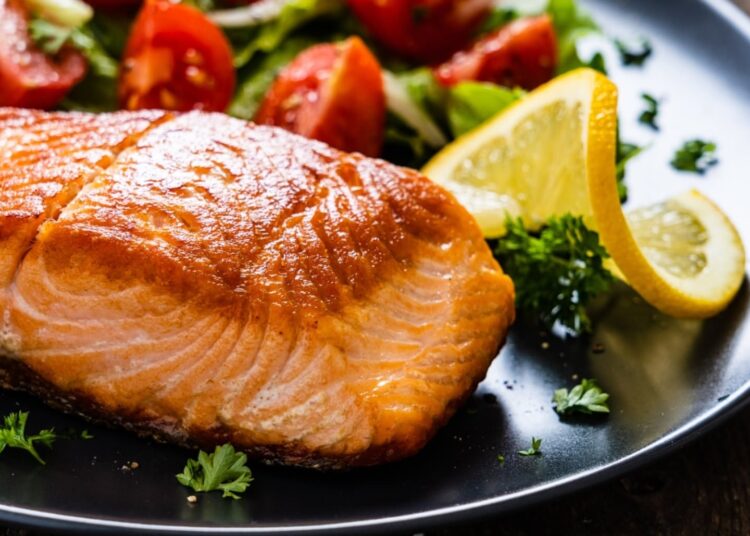 Eating oily fish and other sources of omega-3 fatty acids may preserve brain health and enhance thinking skills in middle age.