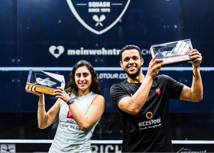 Egyptian duo grabs Grasshopper squash Cup titles 1 - Egyptian Gazette Nour el-Sherbini and Mostafa Asal pose with their trophies.