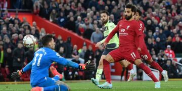 Salah not giving up on Premier League title