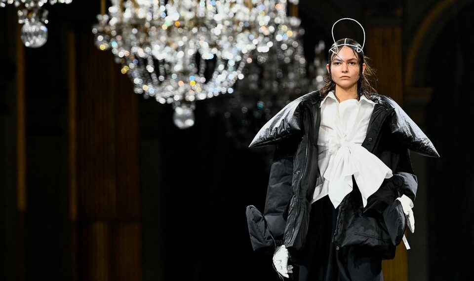 Under a cloud of belt-tightening, Paris Fashion Week struts on